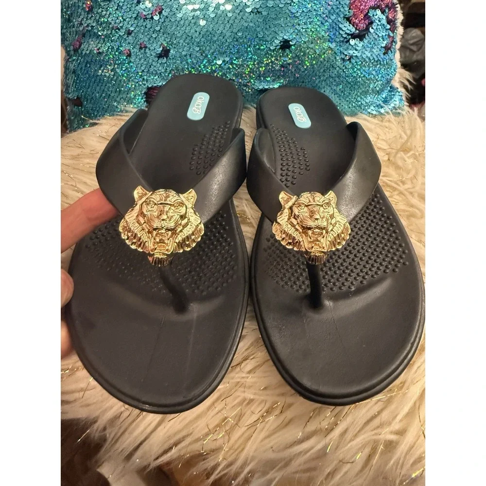 New Okab Black Licorice Gold Lion Head Rubber Flip Flop Thong Sandals Womens M/L